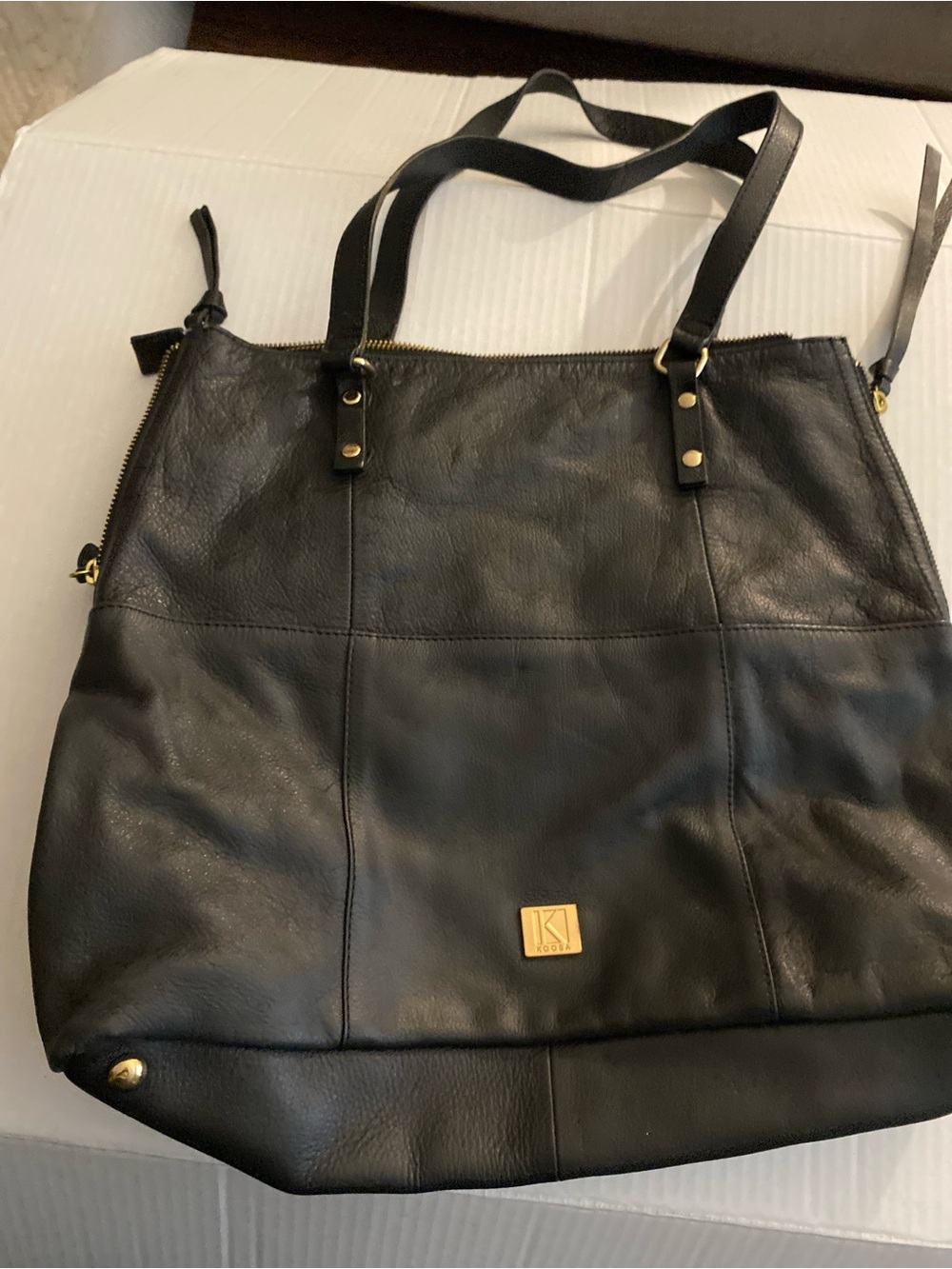 Kooba Everette tote featuring gold-tone hardware and dual shoulder straps.